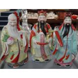 Group of three Chinese porcelain figures of the 'Star gods', polychrome decorated and approx 30cm