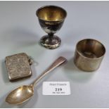 Bag of silver to include: napkin ring, single teaspoon, egg cup and vesta case. 3.2 troy oz