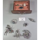 Collection of silver and white metal jewellery to include: peacock and dragonfly brooch, opal