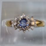 18ct gold blue and white stone cluster ring. 3.9g approx. Size L. (B.P. 21% + VAT)