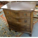 Reproduction mahogany inlaid serpentine four drawer chest of drawers on bracket feet. 72x46x79cm