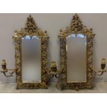 Pair of 19th century brass framed Girandoles mirrors with sconces overall with pierced floral