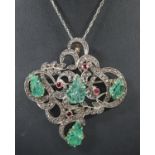 Edwardian diamond, ruby and emerald pendant brooch on silver chain, the brooch with foliate