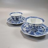 Pair of Chinese blue and white octagonal tea bowls and saucers, decorated to the front and reverse