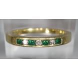 18ct gold diamond and emerald seven stone hoop ring. Ring size N, 3.6g approx. (B.P. 21% + VAT)