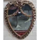 19th century gilt gesso framed heart shaped mirror, the border with pierced foliate decoration,