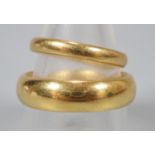 Two 22ct gold wedding bands. Size R and K. Total weight 15g approx. (B.P. 21% + VAT)