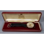 Garrard 9ct gold gentleman's automatic wristwatch with satin face having baton numerals, sweep