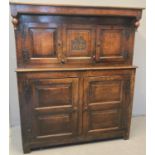 18th century Welsh oak Deuddarn, the moulded cornice with drop finials and two doors with central