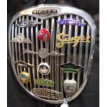 Post War Singer Rootes Group radiator grill mounted with a collection of varied Singer enamel and