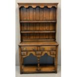 Titchmarsh & Goodwin, oak rack back pot board dresser of small proportions. 92x37x162cm approx. (B.