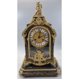 19th century French boulle mantle clock marked 'F Dumouguie', the arched case with gilt metal cherub