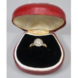 18ct gold diamond cluster ring, the central stone 0.45carat approx. Size Q1/2. 3.4g approx. (B.P.