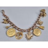 9ct gold charm bracelet comprising full and half sovereign in 9ct mounts dated 1912 and 1897