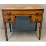 19th century oak lowboy, the moulded top above an arrangement of one long and two short drawers with