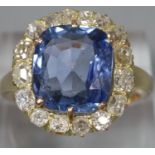 18ct gold sapphire and diamond ring, the sapphire 1.1cm approx. Size N1/2. 7.2g approx. (B.P.