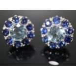 Pair of 18ct Platinum sapphire and aquamarine Edwardian design earrings, the central aquamarine