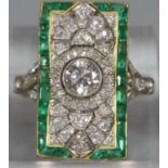 Gold Art Deco diamond and emerald ring of rectangular form, appearing unmarked. Size M. 4.5g approx.