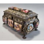 19th century gilt metal repoussé jewellery casket depicting relief porcelain panels of painted