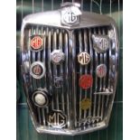 MG Magnette chrome radiator grill set with a variety of different MG octagon shaped and other car