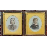 Pair of late Victorian overpainted photographic portraits on opaline glass, gentleman and lady,