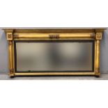 19th century gilt gesso framed over mantle mirror, the indented moulded cornice above three bevelled