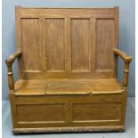Victorian scumbled pine probably Pembrokeshire settle, with four panelled moulded back and shaped