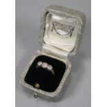 18ct platinum three stone diamond ring, marked 18ct Plat. Size L. 2.5g approx. (B.P. 21% + VAT)