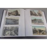 Postcard collection of Welsh topographical cards in black album with good range of towns and