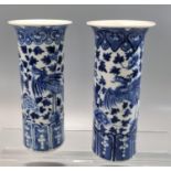 Pair of 19th century Chinese porcelain blue and white cylinder vases with a double Phoenix and Peony