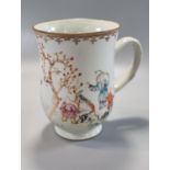 18th century Chinese porcelain cider mug on a splayed foot, painted with Famille Rose enamels