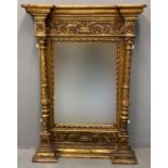19th century gilt gesso framed over mantle mirror, the indented moulded cornice above a carved