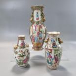 Group of three Chinese porcelain Canton Famille Rose vases, ranging in height from 14.5cm to 23.5cm,