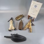 Group of unusual powder and shot flasks, to include: egg shaped worked leather shot flask,