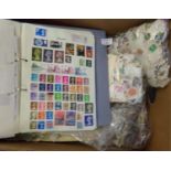 Box with all world selection of stamps and loose and large quantity of an end off paper stamps in
