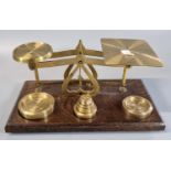 Small wooden based set of brass letter scales with weights, marked 'Made in England'. (B.P. 21% +