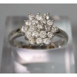 9ct white gold diamond cluster ring. Size M. 3.2g approx. (B.P. 21% + VAT)