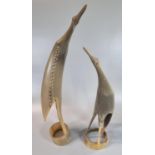 Two similar carved horn figures of stylised birds. (B.P. 21% + VAT)