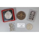 Swiss half oz silver ingot, 1 troy oz Swiss silver ingot, 1957 half crown and a Queen Elizabeth II