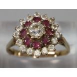 Yellow metal white and red stone cluster ring. (B.P. 21% + VAT)