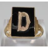 9ct gold signet ring with black hard stone and initial 'D'. size R. 3.5g approx. (B.P. 21% + VAT)