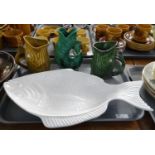 Tray of moulded ceramic fish design items to include: a fish platter, various glug glug or Gluggle