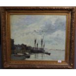 After Seago, estuary scene with moored and beached boats under a lowering sky. Unsigned. Oils on