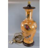 Unusual baluster vase now converted to a lamp on an orange Fairyland lustre style ground with