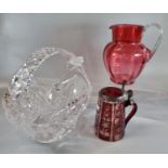 Collection of glass to include: cut glass basket, Victorian cranberry single handled jug and a