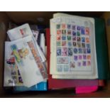 All world collection of stamps in albums and stockbooks and range of FDCs in box and loose. (B.P.