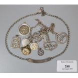 Bag of silver to include: St Christopher pendants, chains, heart charms etc. (B.P. 21% + VAT)