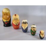 Group of Russian Soviet era Babushka male dolls representing political figures including Brezhnev