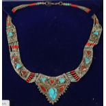 South American white metal necklace inlaid with turquoise and agate stones. (B.P. 21% + VAT)