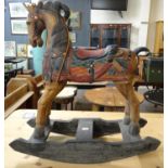 Hand carved wooden child's rocking horse. Possibly Malaysian. (B.P. 21% + VAT)